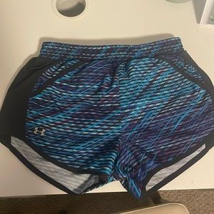 Under Armour running shorts, size small, color black/blue/purple